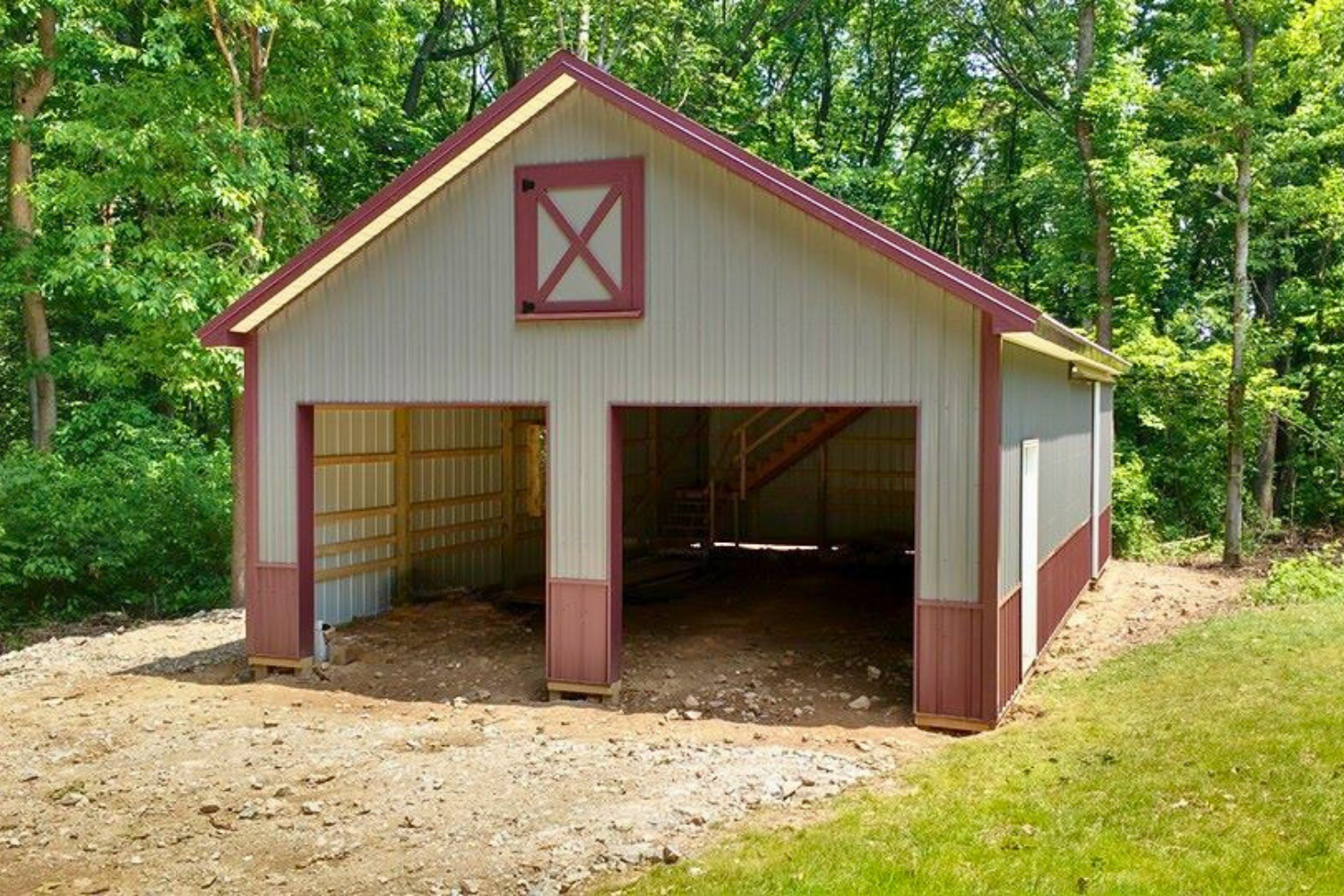 Beige pole barn garage in Williamstown NJ with red accents